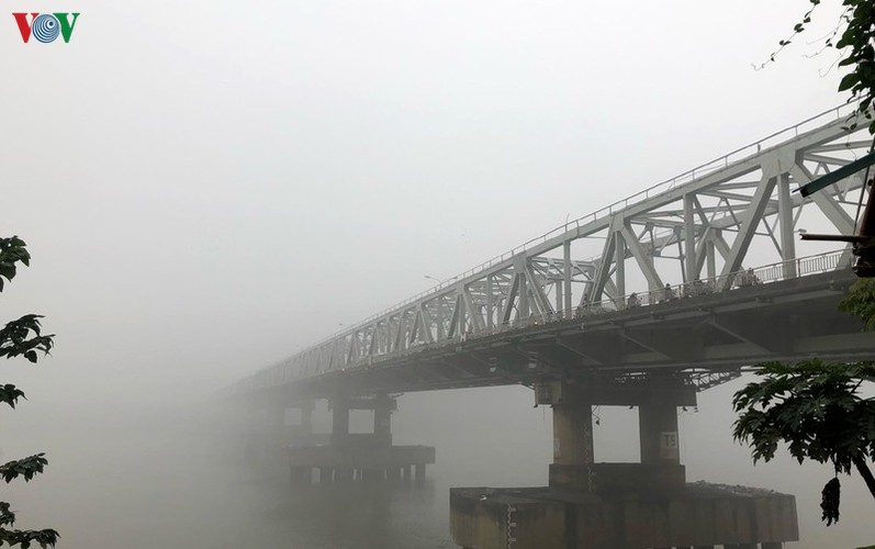 dense fog descends on the streets of hanoi hinh 8