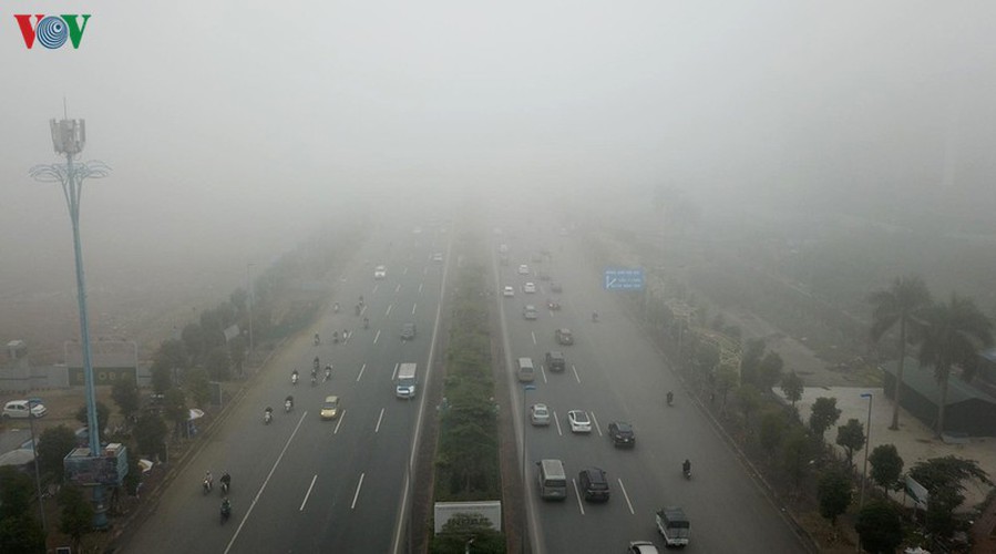 dense fog descends on the streets of hanoi hinh 9