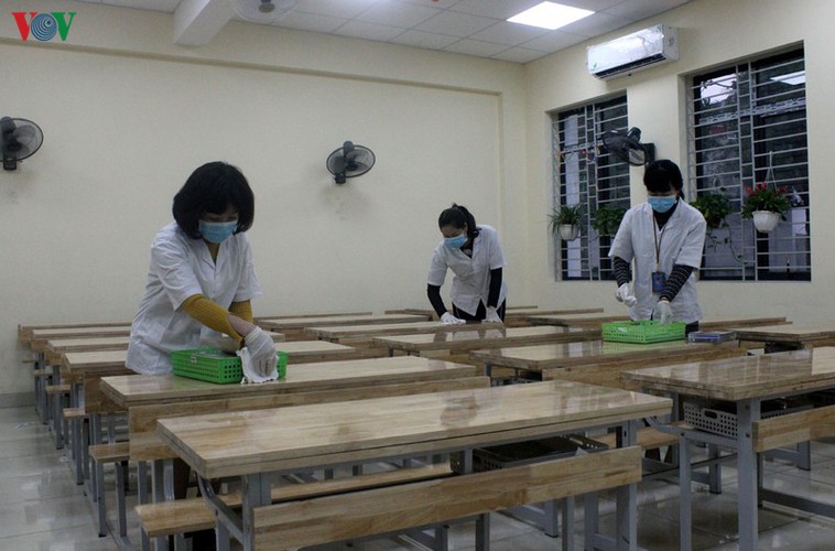 hanoi authorities spray schools with disinfectant to combat ncov infection hinh 13