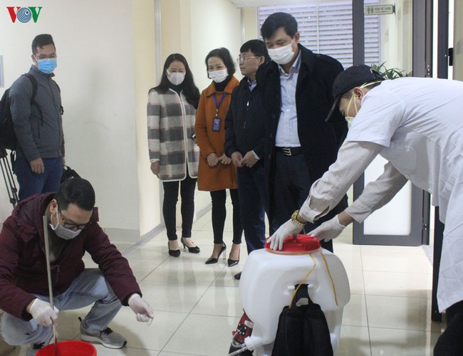 hanoi authorities spray schools with disinfectant to combat ncov infection hinh 2