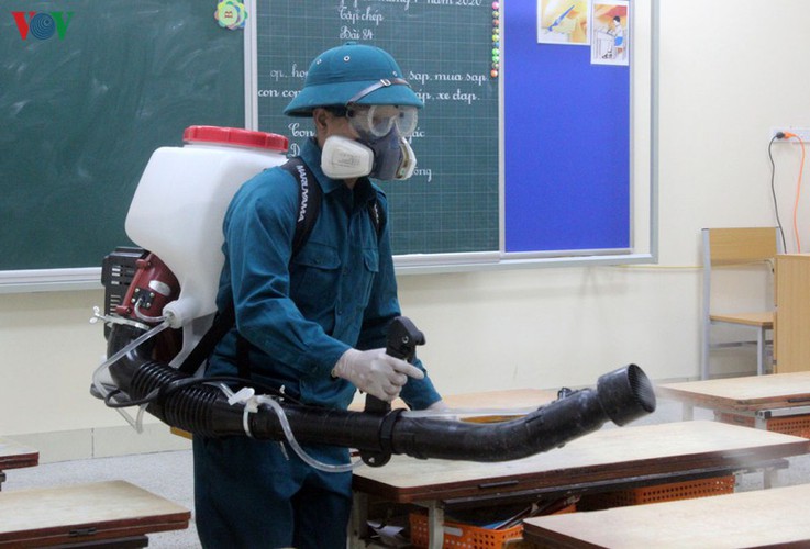hanoi authorities spray schools with disinfectant to combat ncov infection hinh 3
