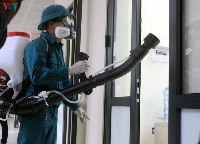 hanoi authorities spray schools with disinfectant to combat ncov infection hinh 4