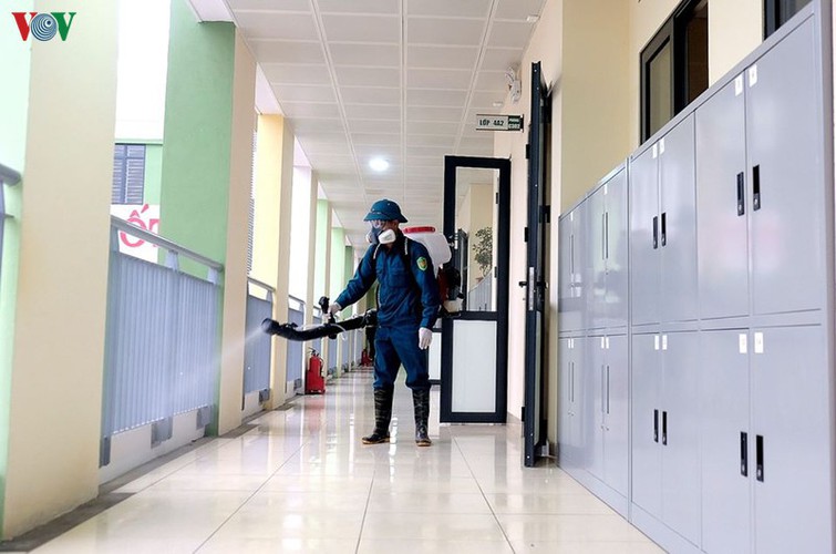 hanoi authorities spray schools with disinfectant to combat ncov infection hinh 5