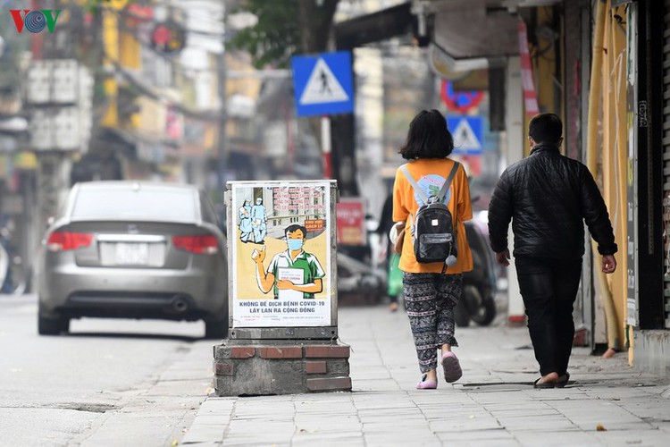 streets of hanoi filled with informative messages to aid fight against covid-19 hinh 10