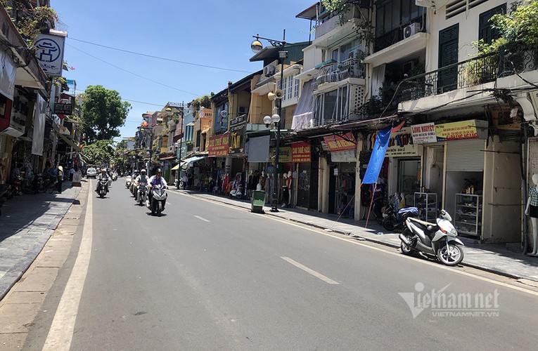 hanoi endures second heat wave, temperatures drop in hcm city hinh 4