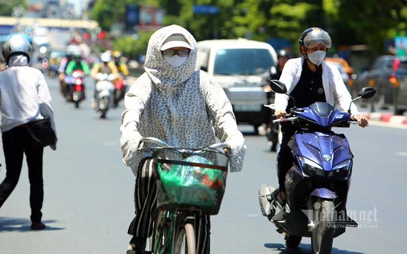 hanoi endures second heat wave, temperatures drop in hcm city hinh 7