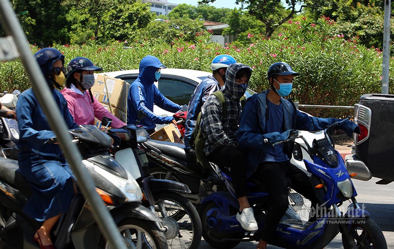 hanoi endures second heat wave, temperatures drop in hcm city hinh 8