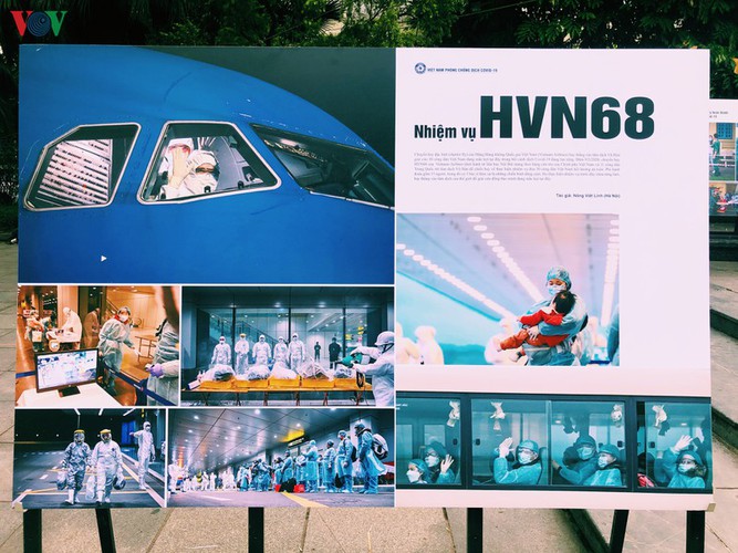 photo exhibition showcases vietnamese battle against covid-19 epidemic hinh 13