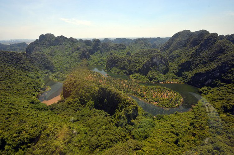 discovering trang an landscape complex by helicopter hinh 6