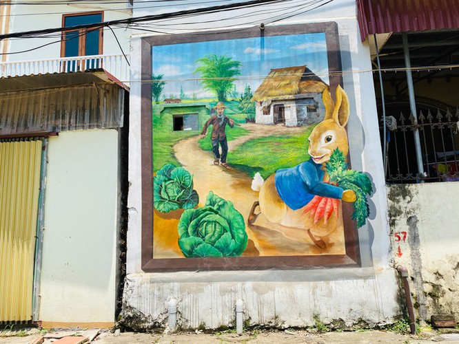 a close-up of largest mural paintings in hanoi hinh 10