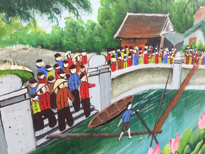a close-up of largest mural paintings in hanoi hinh 16