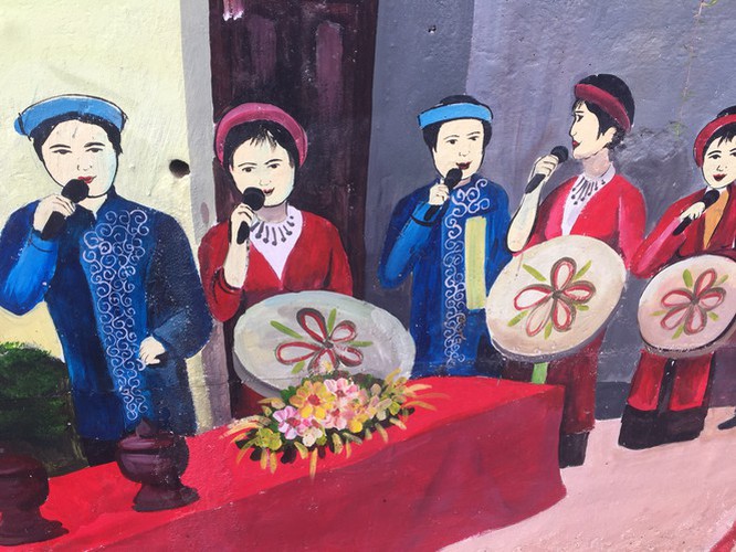 a close-up of largest mural paintings in hanoi hinh 18