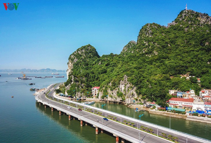 discovering scenic coastal road in ha long hinh 2