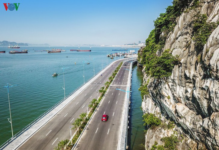 discovering scenic coastal road in ha long hinh 4