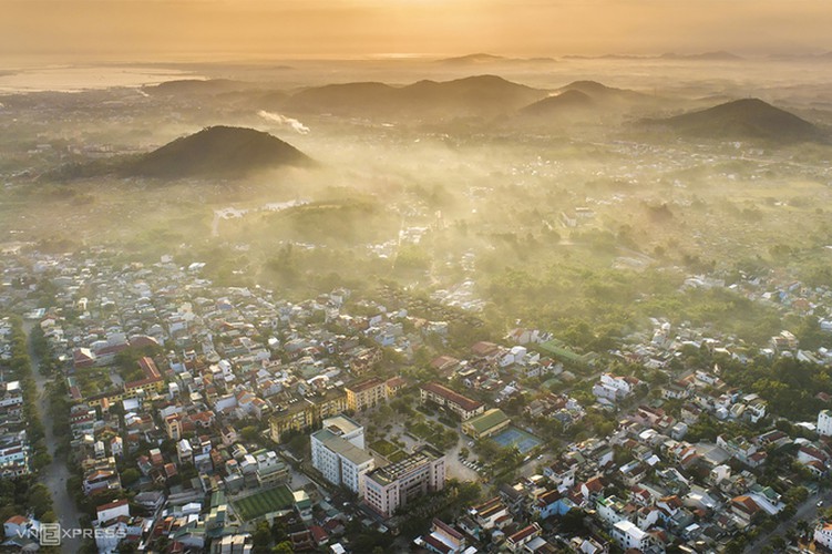 a view of hue’s stunning architecture amid foggy conditions hinh 1