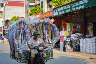 Song Ho commune make paper offerings ahead of Ghost Month