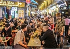 Return of foreign tourists breathes energy back into Ta Hien street
