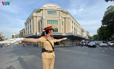 Traffic wardens work hard under the scorching sun