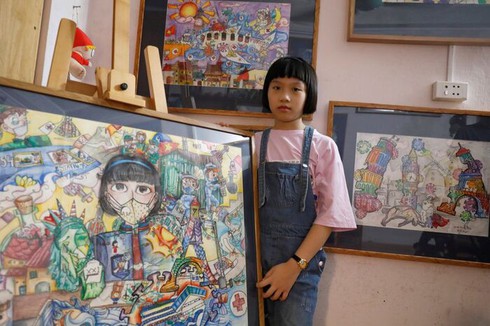 foreign media hails vietnam schoolgirl’s effort to create art from chaos hinh 0
