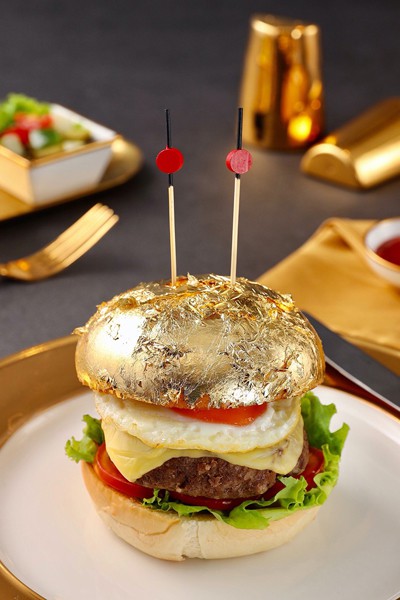 what makes hanoi’s first gold-plated hotel special? hinh 14