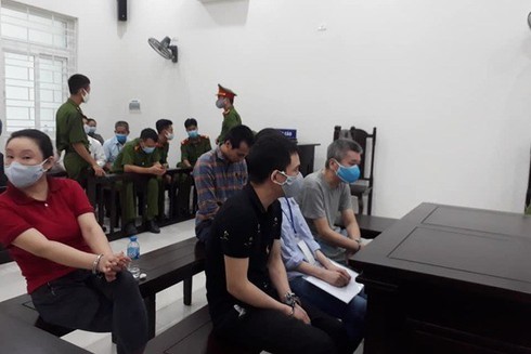 two foreigners sentenced for illegally sending people abroad hinh 0