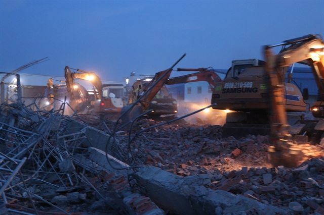 Ten killed, many injured as under-construction wall collapses in Dong Nai