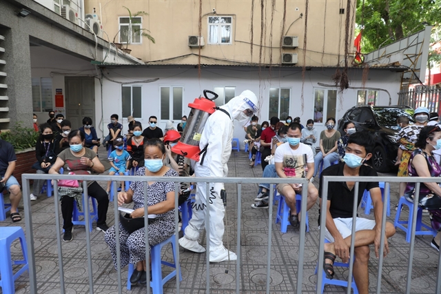 Vietnam reports record number of new COVID-19 cases for fourth day in a row