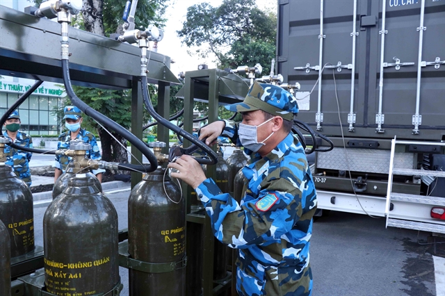 Mobile oxygen-production stations provide oxygen cylinders to hospitals in need in HCM City
