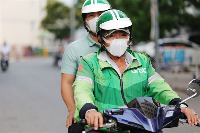 Motorbike taxis resume in Hanoi after six-month pause