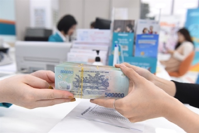 Tiền ngân hàng dồn dập đổ vào bất động sản - 1