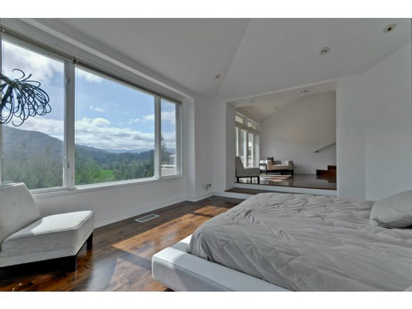 this-bedroom-has-a-beautiful-view-of-the-hillside-the-house-has-six-bedrooms-in-total.jpg