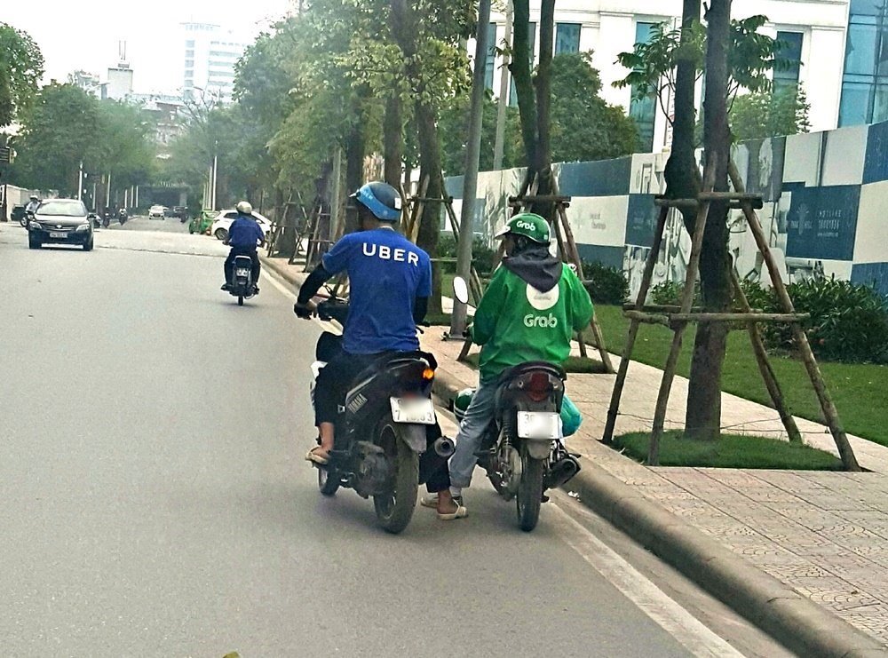 Vụ Grab thâu tóm Uber có dấu hiệu vi phạm pháp luật