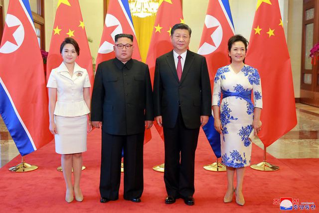 Nhan sắc yêu kiều của nữ ca sĩ là phu nhân ông Kim Jong Un, biểu tượng thời trang Triều Tiên - Ảnh 7.