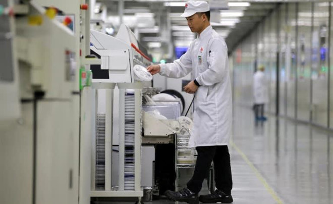 Huawei cat giam san xuat, chuan bi cho tuong lai u toi hinh anh 1