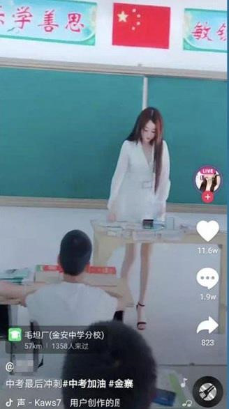 Co gai Trung Quoc bi ‘nem da’ vi mac vay ngan, dong gia giao vien hinh anh 1