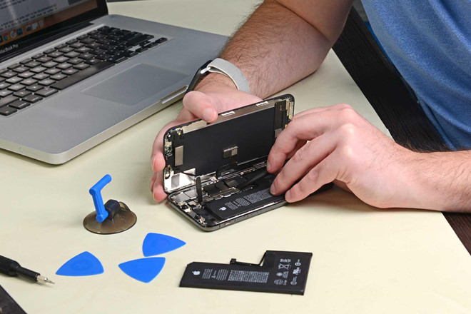 Vi sao khach hang thay pin iPhone chinh hang van bi bao loi? hinh anh 2