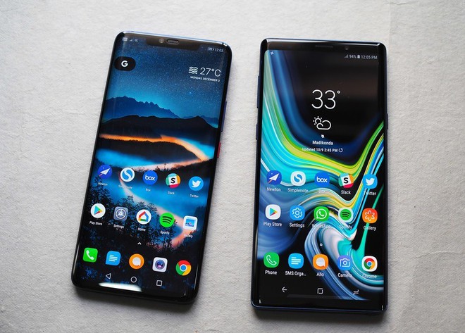 Nen mua di dong cao cap doi cu hay may tam trung nam nay? hinh anh 2