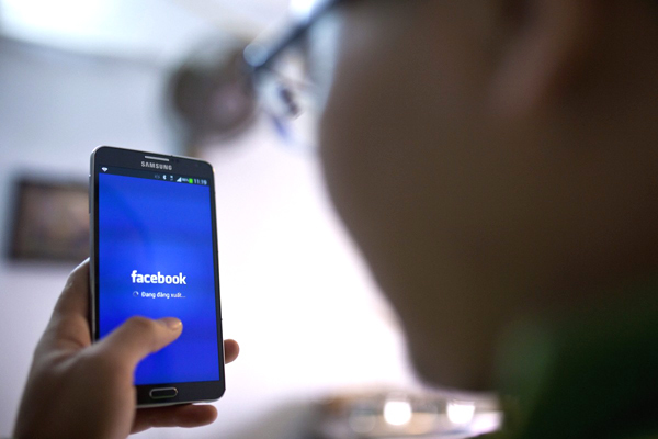 Người dân share link báo trên Facebook không vi phạm Nghị định 15/2020