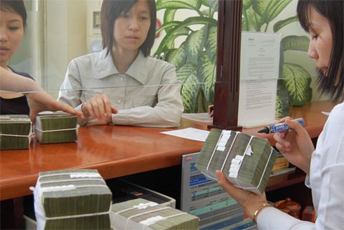 Hạ lãi suất mùa cao điểm có bất thường? - ảnh 1