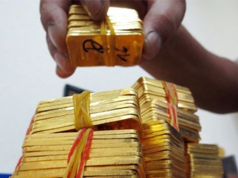 Vàng miếng: Siết giá bán, thả ga ép giá thu mua? - ảnh 1