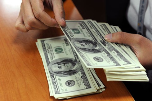 Mỗi USD đắt thêm 212 đồng từ 7/1 - ảnh 1