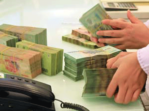 Lãi suất tối đa 20%, theo luật nào mới đúng? - ảnh 1