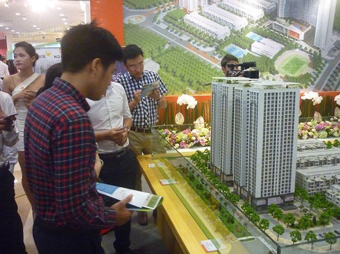 Mua bán nhà ở giảm mạnh tại Hà Nội và TP.HCM - ảnh 1