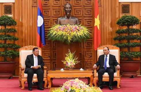 Chủ tịch nước CHDCND Lào Bounnhang Vorachith thăm hữu nghị Việt Nam - ảnh 1