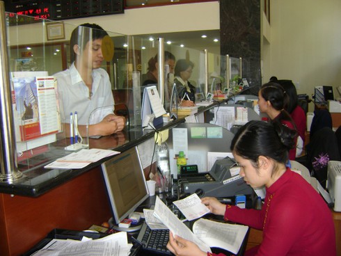 Hạ một loạt lãi suất chủ chốt từ 18/3 - ảnh 1