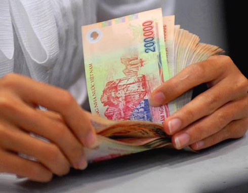 Trả lương chậm quá 15 ngày phải trả thêm tiền - ảnh 1