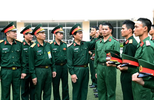 Từ 1/4 chiến sĩ toàn quân cắt tóc 3 phân, không để râu ria - ảnh 1