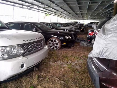 Hình ảnh 144 xe sang trong vụ án Dũng 'mặt sắt' nằm phủ bụi - ảnh 2