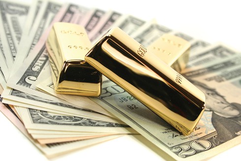 Giá vàng hôm nay 23/12 giảm, giá USD giữ mức kịch trần cả tuần - ảnh 1