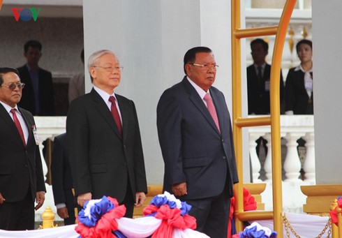 Tổng Bí thư Nguyễn Phú Trọng bắt đầu chuyến thăm CHDCND Lào - ảnh 10